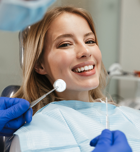 Female patient smiling at dentist in Bozeman