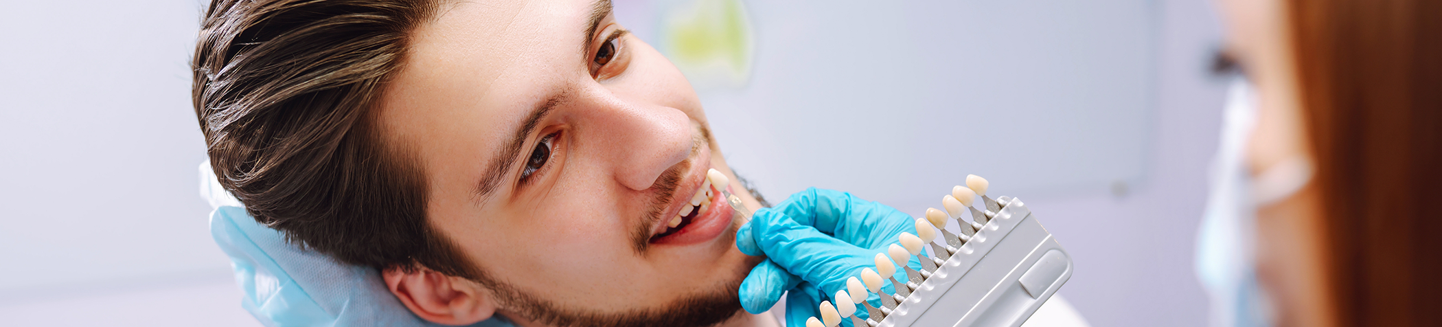 Close up of male patient during shade matching