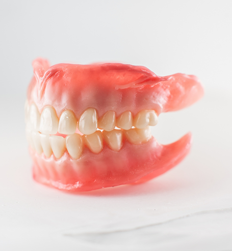 Close up of full dentures for upper and lower arch