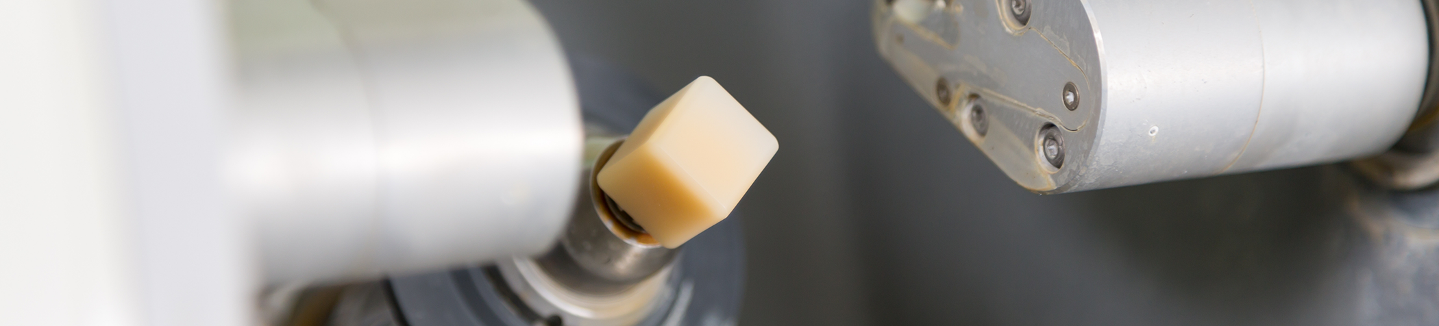 Block of ceramic material in device