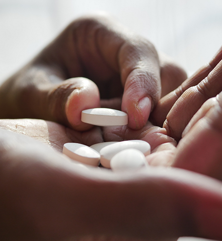 Placing pills for oral conscious sedation in hand