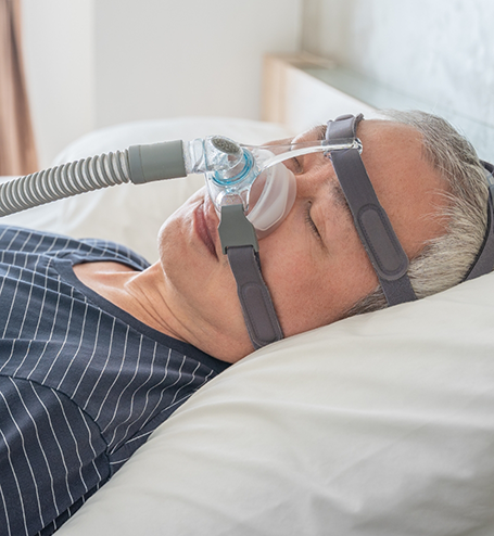 Sleep apnea patient with CPAP machine